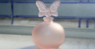 Pink Perfume Bottle With Butterfly